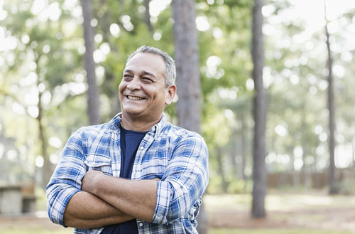 /Muni-website/media/Images/Specialized_Dockets/Slider_RecoveryCt/recovery-participant-hispanic-man-happy-crossing-arms.jpg?ext=.jpg