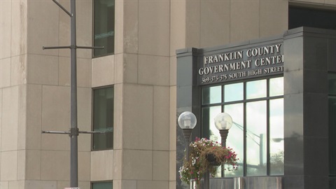 A photo of the entrance of the Court building